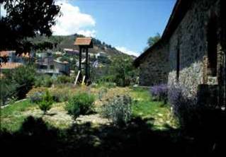 Kyperounta, the Museum of the Holy Cross and the garden of aromatic herbs around it, created in 1994. Views before and after.